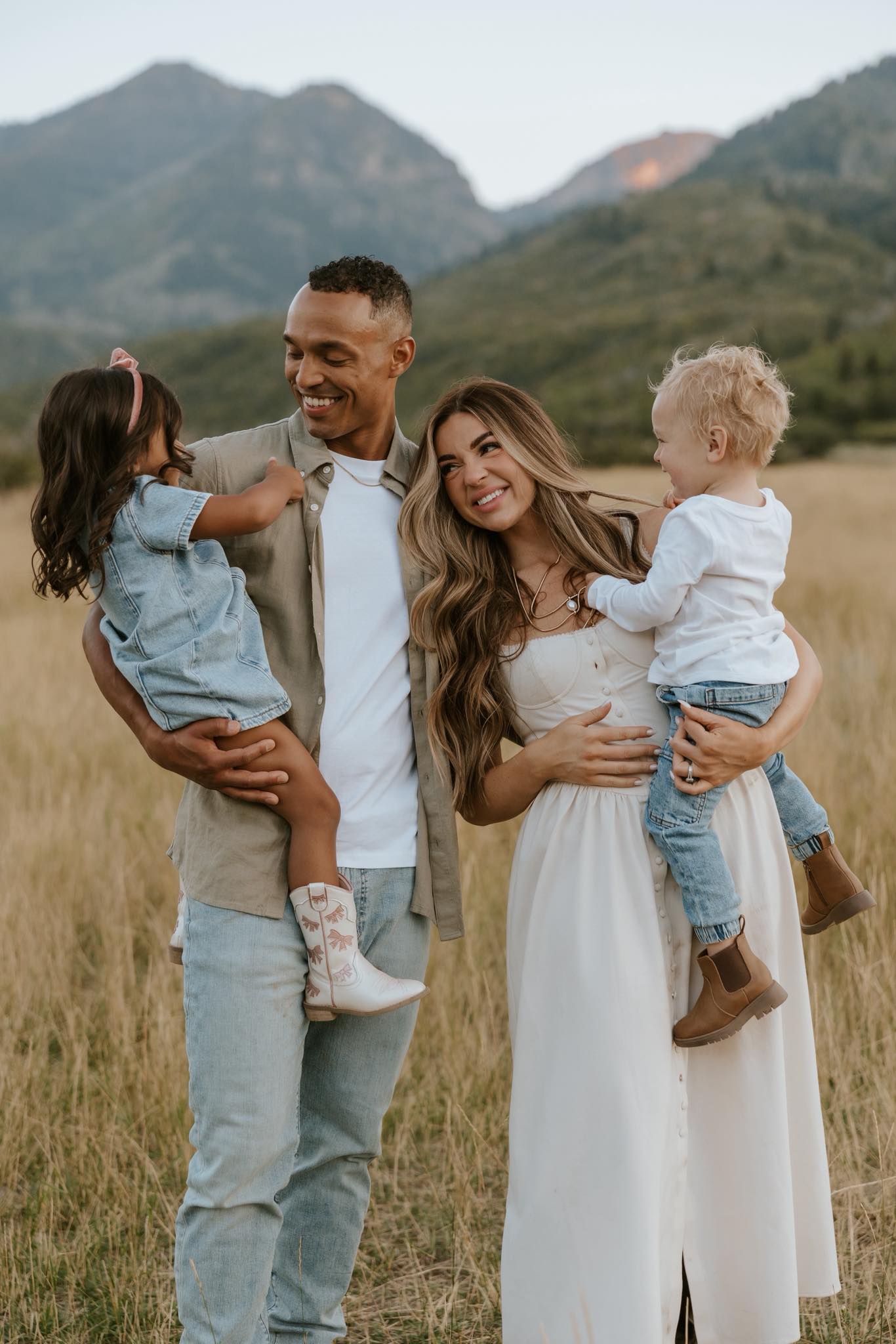 Jordan and Kensie, owners of Jordan Valley Lawn Care, with their family